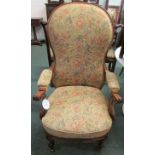 Victorian armchair with carved mahogany frame, scrolled arms with padded rests, more recently re-