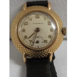 18 carat gold Vulcain ladies wristwatch with black leather strap, Arabic chapter with subsidiary