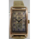 9 carat gold Rotary Maximus gents wristwatch with a gold plated flexible bracelet