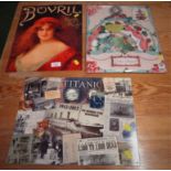 TWO REPRODUCTION TIN SIGNS - BOVRIL AND TITANIC CENTENARY, TOGETHER WITH CARD CAKE STAND