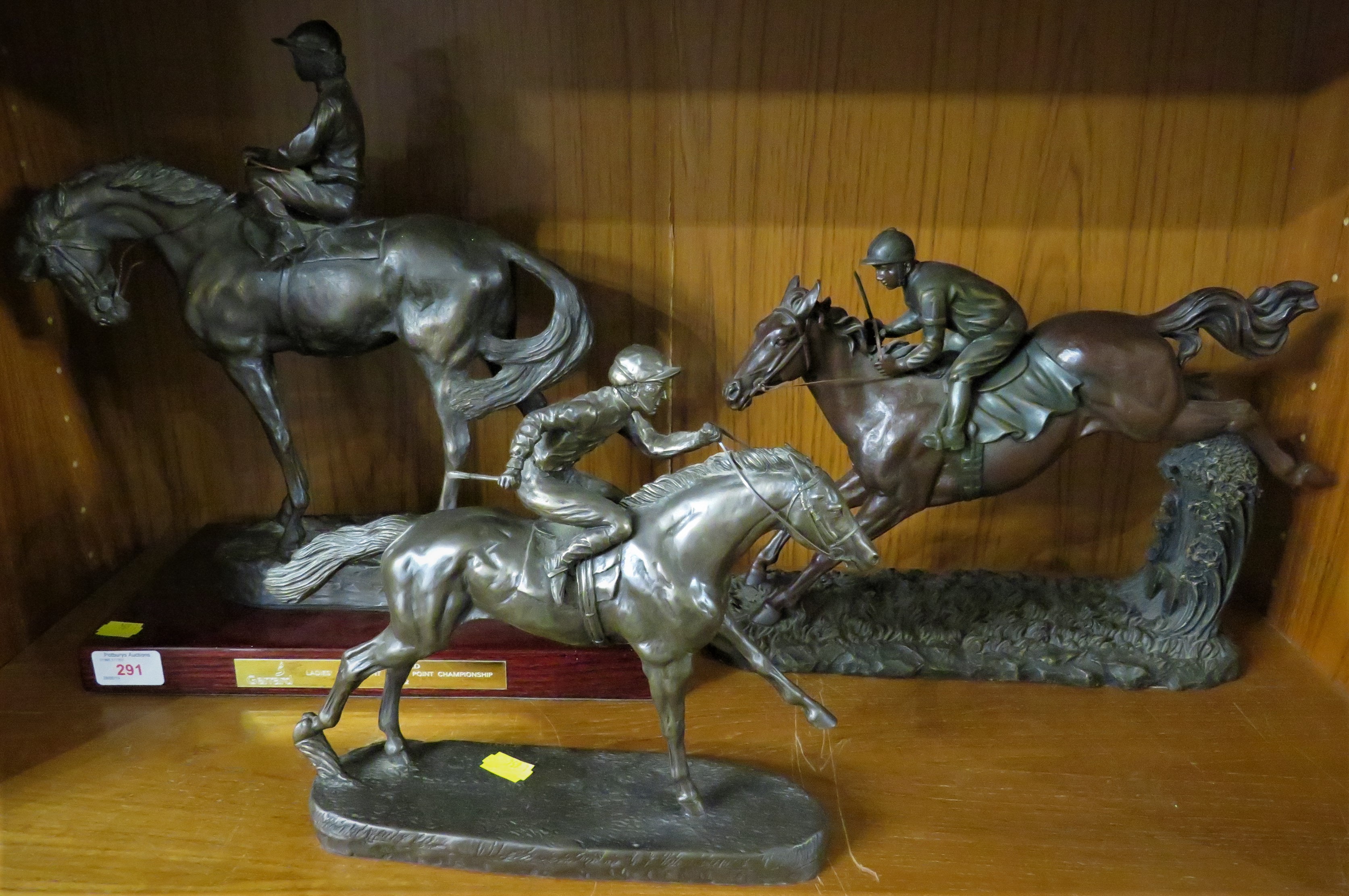 HEREDITIES THE FAVOURITE DG16 BRONZE EFFECT FIGURE OF HORSE AND JOCKEY, ONE OTHER BRONZE EFFECT