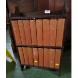 SIXTEEN VOLUMES OF CHARLES DICKENS NOVELS PUBLISHED BY ODHAMS PRESS IN OAK TWO SHELF STAND