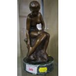 BRONZED METAL FIGURE OF SEATED NUDE WOMAN, INSCRIBED 'NOCE', STANDING ON A CIRCULAR GREEN MARBLE