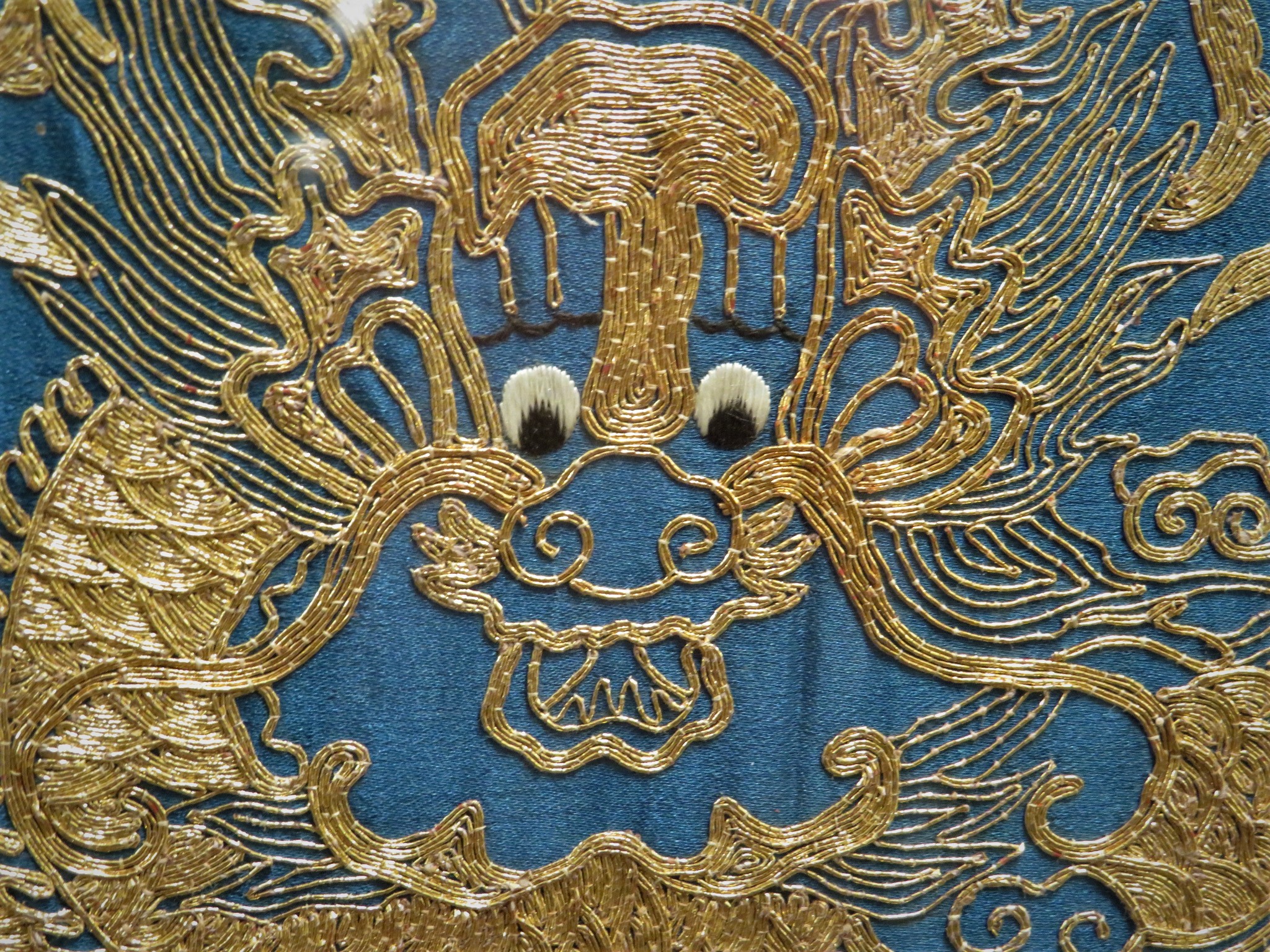 FRAMED AND GLAZED EMBROIDERY IN GOLD COLOURED THREAD DEPICTING CHINESE DRAGON WITH STYLIZED CLOUDS - Image 8 of 8