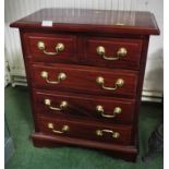 RED WOOD VENEERED SMALL CHEST OF TWO SHORT OVER THREE LONG DRAWERS WITH BRASS HANDLES