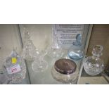 DRESSING TABLE JAR WITH ENGINE TURNED LID, FOUR GLASS STOPPERED DRESSING TABLE BOTTLES (INCLUDING