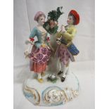 CONTINENTAL PORCELAIN FIGURAL GROUP OF LADY AND GENTLEMAN WITH FOLIAGE