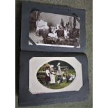 EDWARDIAN POSTCARD ALBUM WITH CONTENTS OF GREETINGS, TOPOGRAPHICAL, AND OTHER POSTCARDS