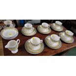 WEDGWOOD MISTRAL TEA SET - SIX CUPS AND SAUCERS, SIX PLATES, FOUR BOWLS AND A MILK JUG