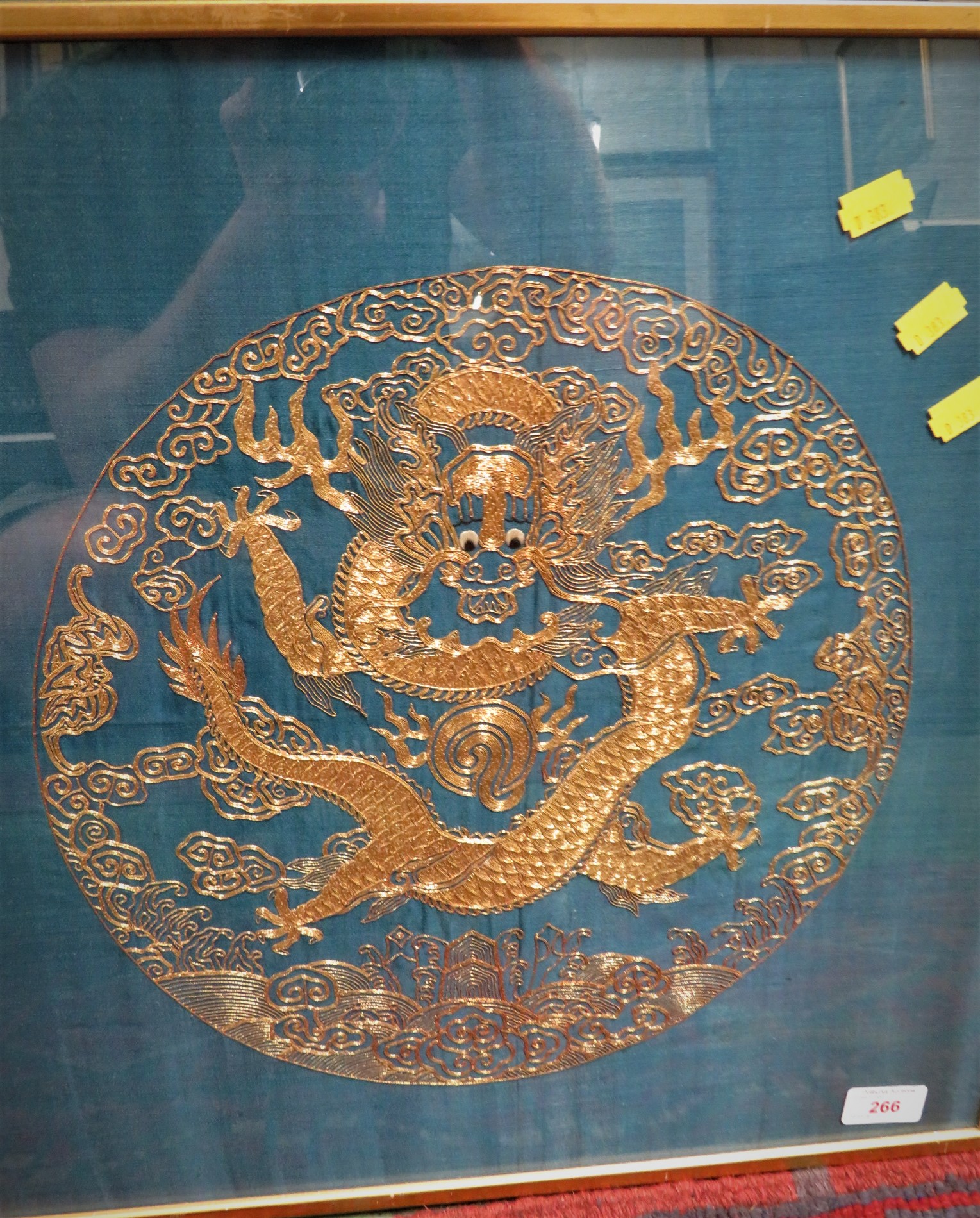 FRAMED AND GLAZED EMBROIDERY IN GOLD COLOURED THREAD DEPICTING CHINESE DRAGON WITH STYLIZED CLOUDS - Image 2 of 8
