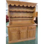 PINE KITCHEN DRESSER, THREE SHELVES TO TOP AND THREE DRAWERS OVER THREE DOORS TO BASE