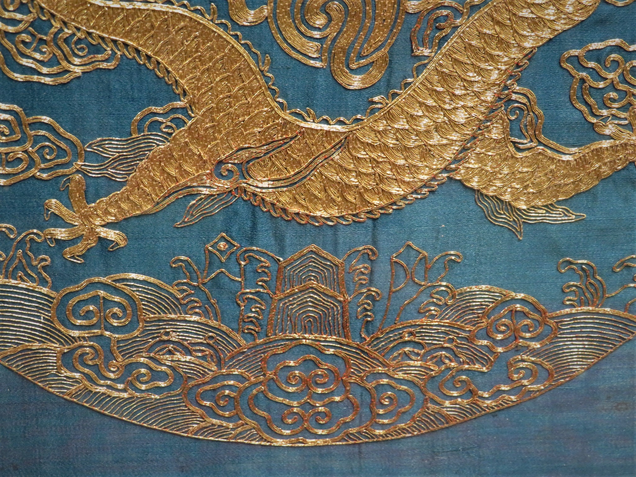 FRAMED AND GLAZED EMBROIDERY IN GOLD COLOURED THREAD DEPICTING CHINESE DRAGON WITH STYLIZED CLOUDS - Image 5 of 8