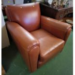 TAN LEATHER EFFECT ARMCHAIR