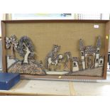 CERAMIC TABLEAU OF CHAUCERIAN FIGURES WITH TREES AND CASTLE, MOUNTED ON A HESSIAN BACK AND IN A TEAK