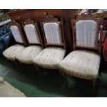 SET OF FOUR MAHOGANY SIDE CHAIRS WITH CARVED DETAIL AND STRIPED FOLIATE UPHOLSTERED SEATS AND BACKS