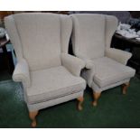 PAIR OF PARKER KNOLL WINGBACK ARMCHAIRS IN OATMEAL UPHOLSTERY