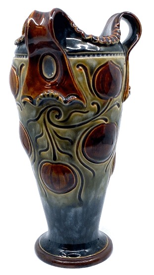 Doulton Lambeth vase by Frank Butler of tapering ovoid form, green-blue ground, decorated with