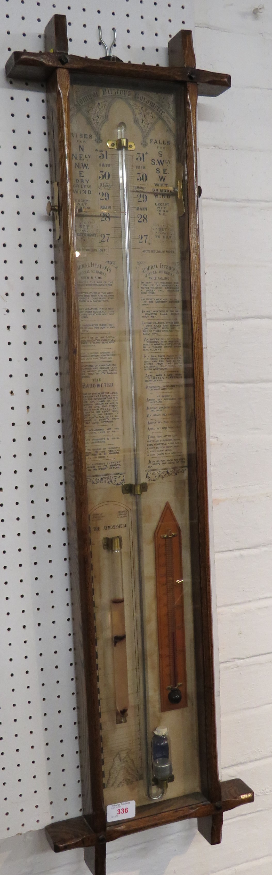 An Admiral Fitzroy barometer in oak case, height 102cm