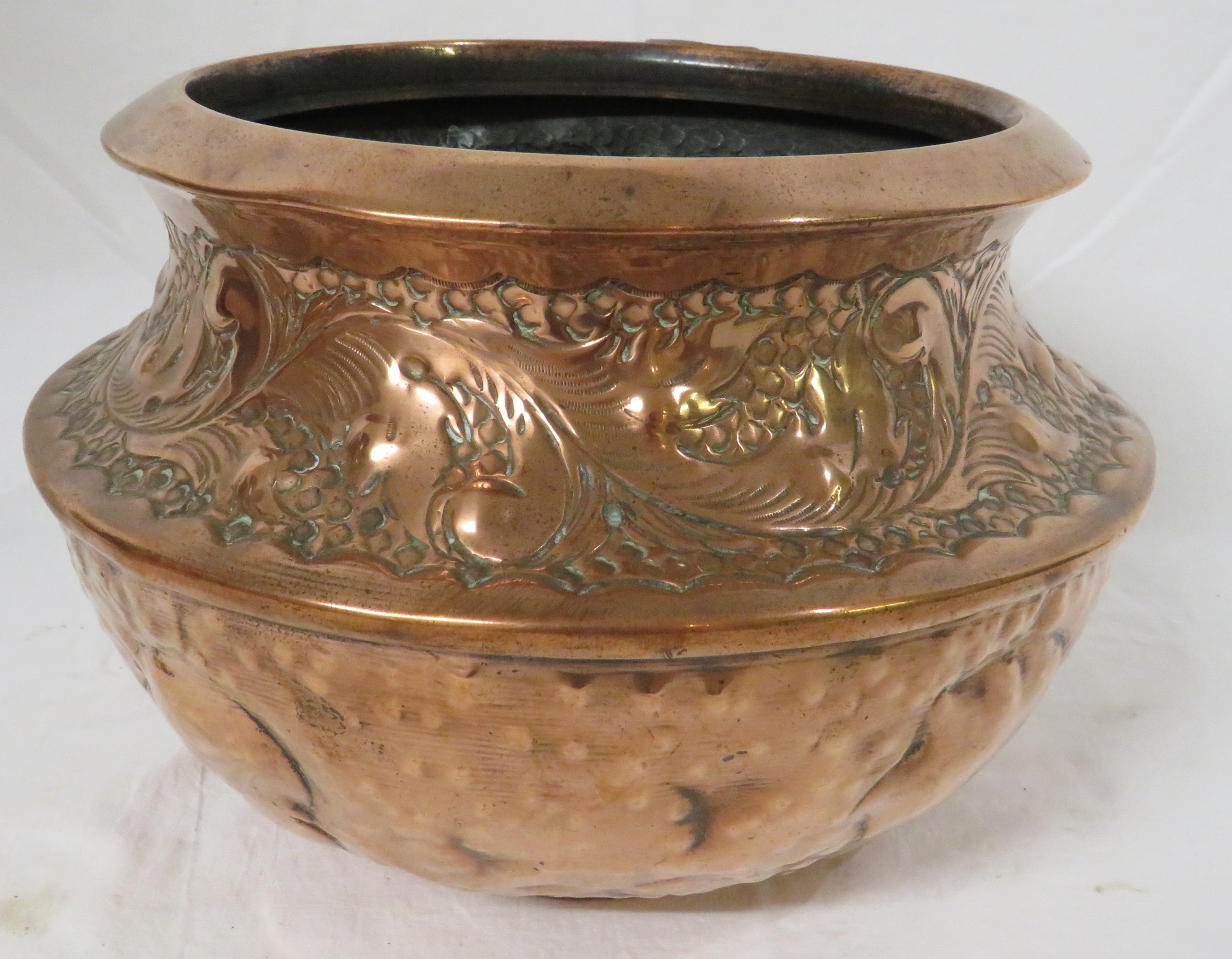 A copper jardiniere on stand, the jardiniere or planter as a bowl with expressed hammer work and a - Image 4 of 5