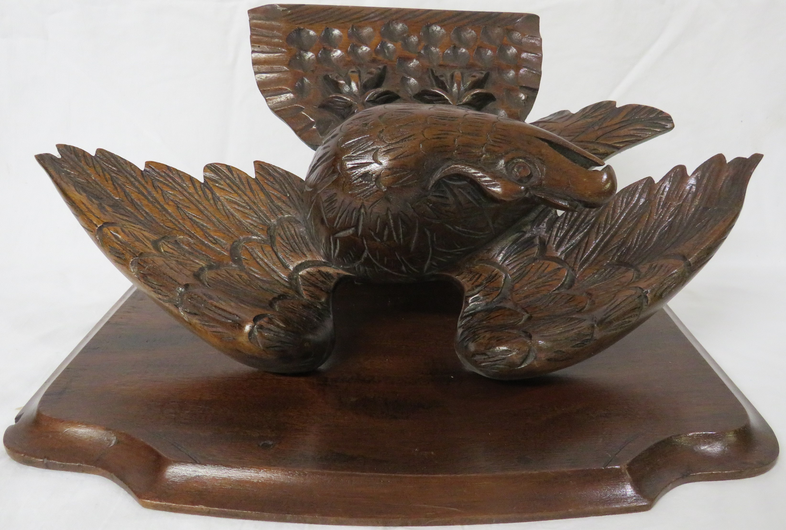 A single-shelf mahogany wall bracket raised and supported on a carved oak eagle, overall height - Image 3 of 4