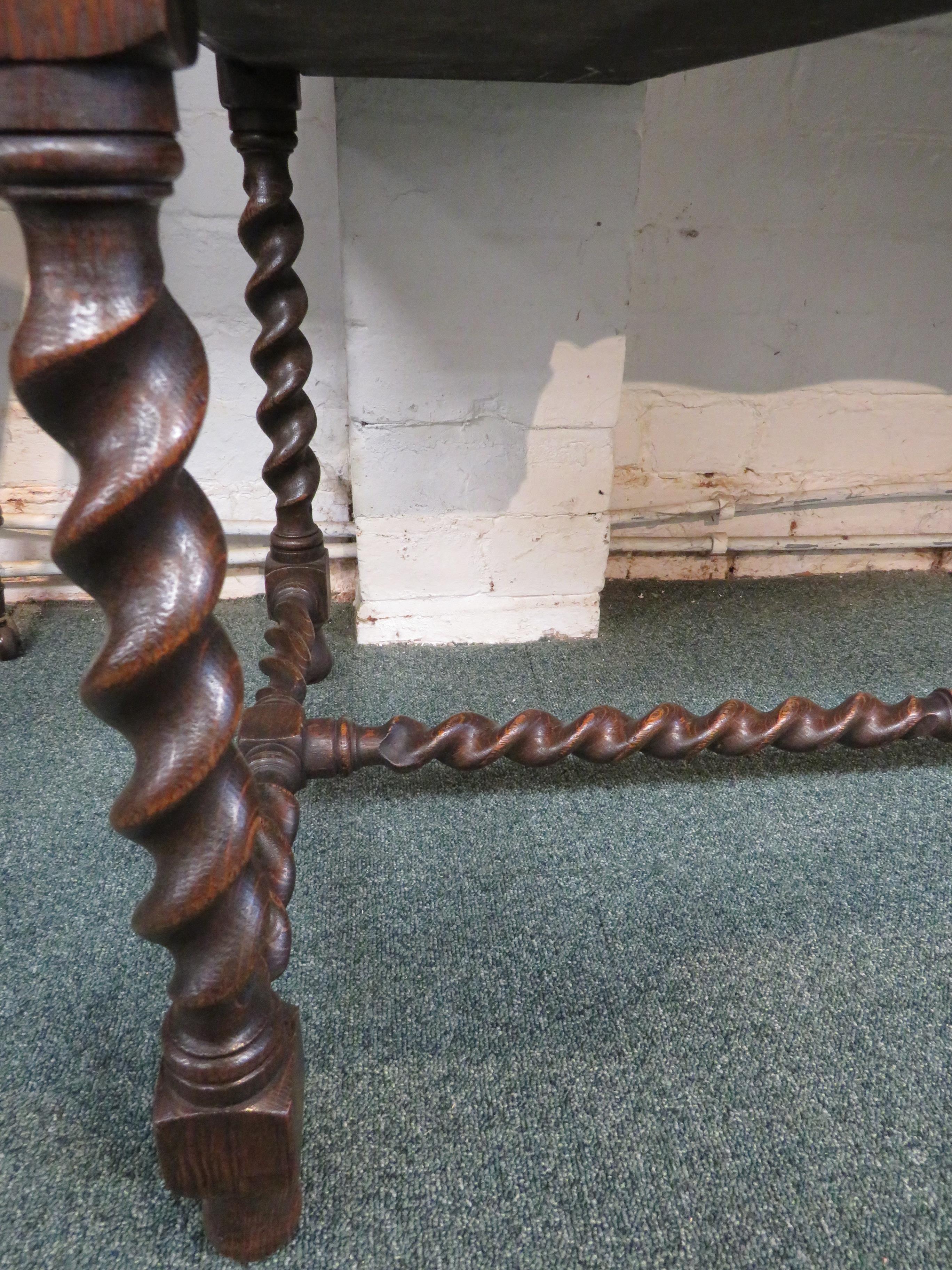 Oak desk on spiral turned legs and stretcher, the top with green leather scriber with embossed - Image 6 of 7