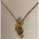 9 carat gold box chain necklace with knot pendant, clasp stamped 9K, 4.4g