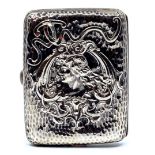 Marples & Co Edwardian silver cigarette case, the planished top with repousse woman's head amongst