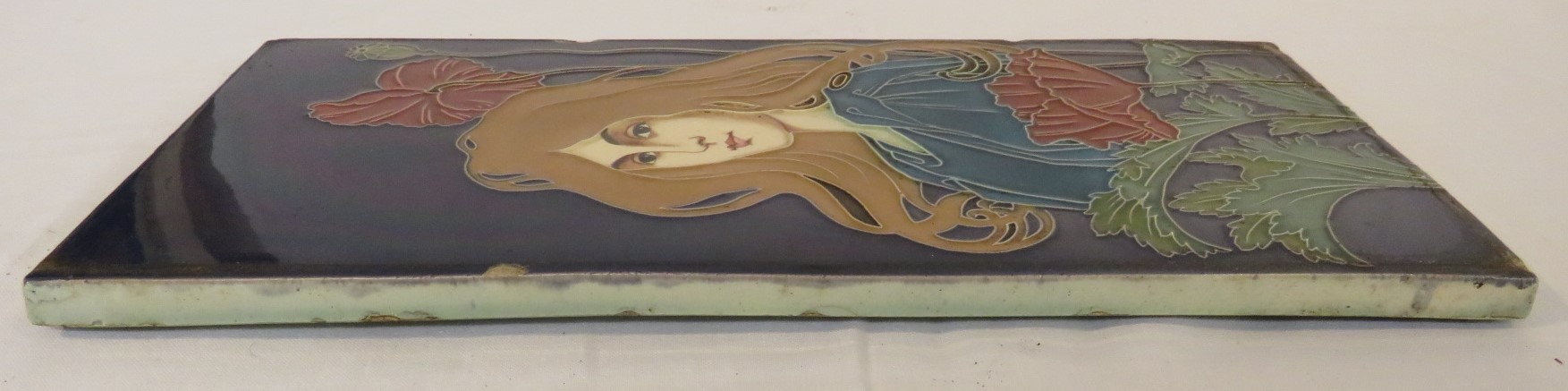 An Art Nouveau ceramic tile by Carl Sigmund Luber, depicting head and shoulders of woman in blue - Image 9 of 14