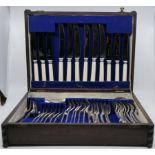 Oak canteen of assorted silver-plated and bone handled cutlery, the canteen with hinged lid and