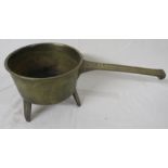 Brass skillet raised on three legs, handle marked 41B, length 45.5cm, height 17.5cm