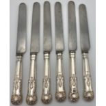 Six Victorian steel dinner knives with silver clad Kings pattern handles engraved with arms of crown