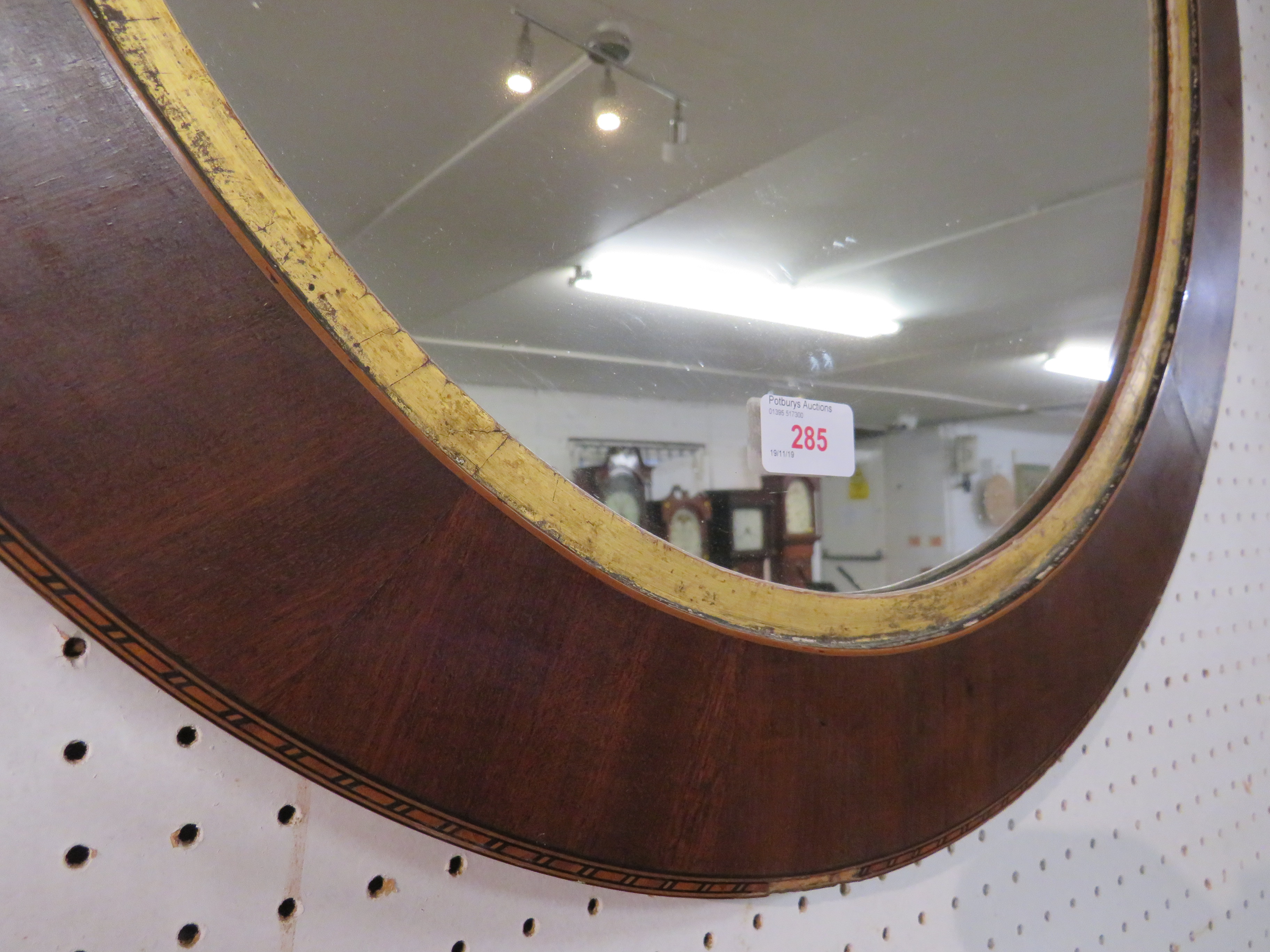 Oval wall mirror in mahogany frame with an inner gilded margin and ebony and boxwood feather - Image 2 of 2