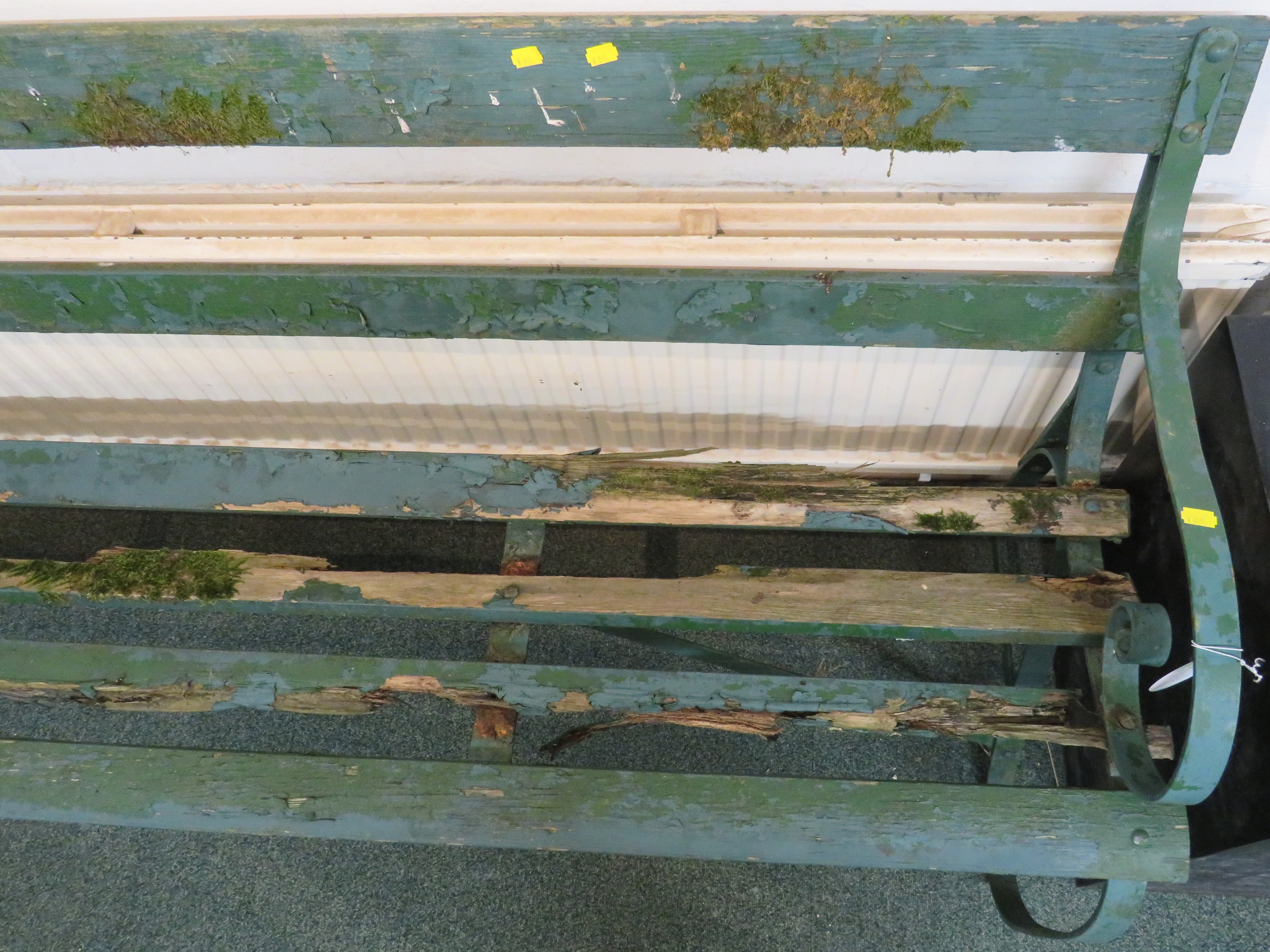 A wooden slatted garden bench with scrolled wrought metal ends, painted green, height 80cm, length - Image 3 of 4