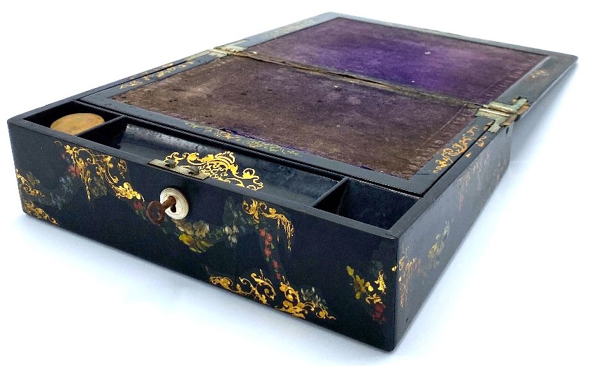 Victorian lady's writing slope, the box slope-fronted in black lacquer with mother of pearl