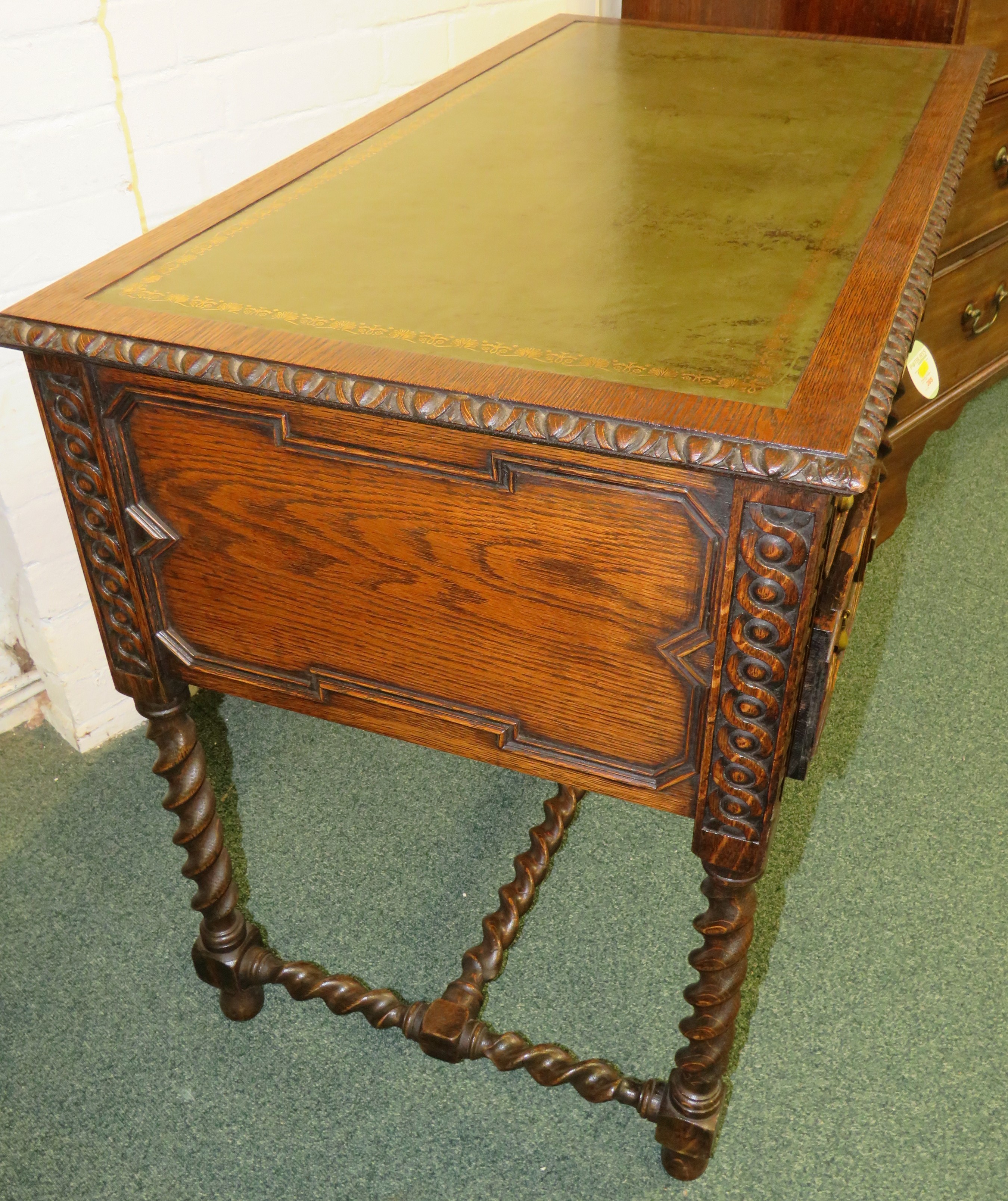 Oak desk on spiral turned legs and stretcher, the top with green leather scriber with embossed - Image 7 of 7