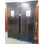 Pair of elegant and narrow Chinese style wardrobes, hardwood with a craquelure black lacquer finish,