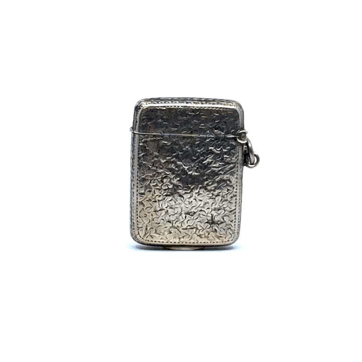 A Victorian silver vesta engraved with clover leaves and set with a yellow metal escutcheon engraved - Image 2 of 3
