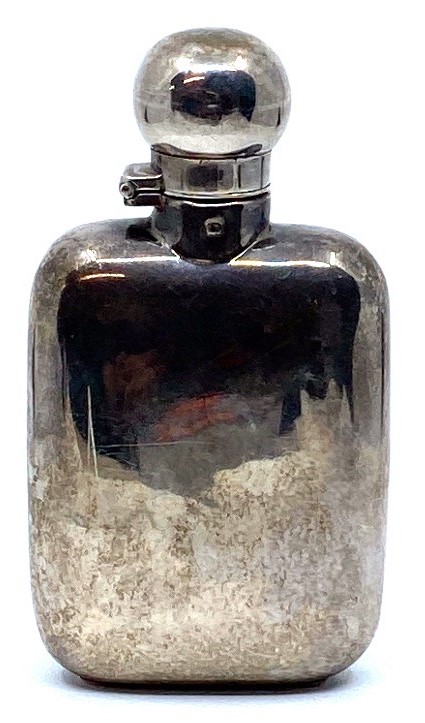 Silver pocket flask with a hinged lid with rotating catch, marks for London,1932, height 11cm, width