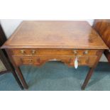 19th century banded oak desk with one long drawer over two short drawers either side of a wavy