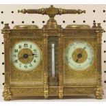 A 19th century heavily chased brass and gilded bevelled glass combination carriage clock housing