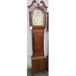 A 30 hour Victorian long case clock in oak case with mahogany cross banding by Shakespear of Burton.