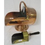 Copper coal scuttle with hinged handle and brass mounts (height excluding handle 31cm), together