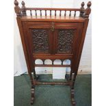 Edwardian carved mahogany secrétaire à abbatant, fall-front panel carved with angels amongst