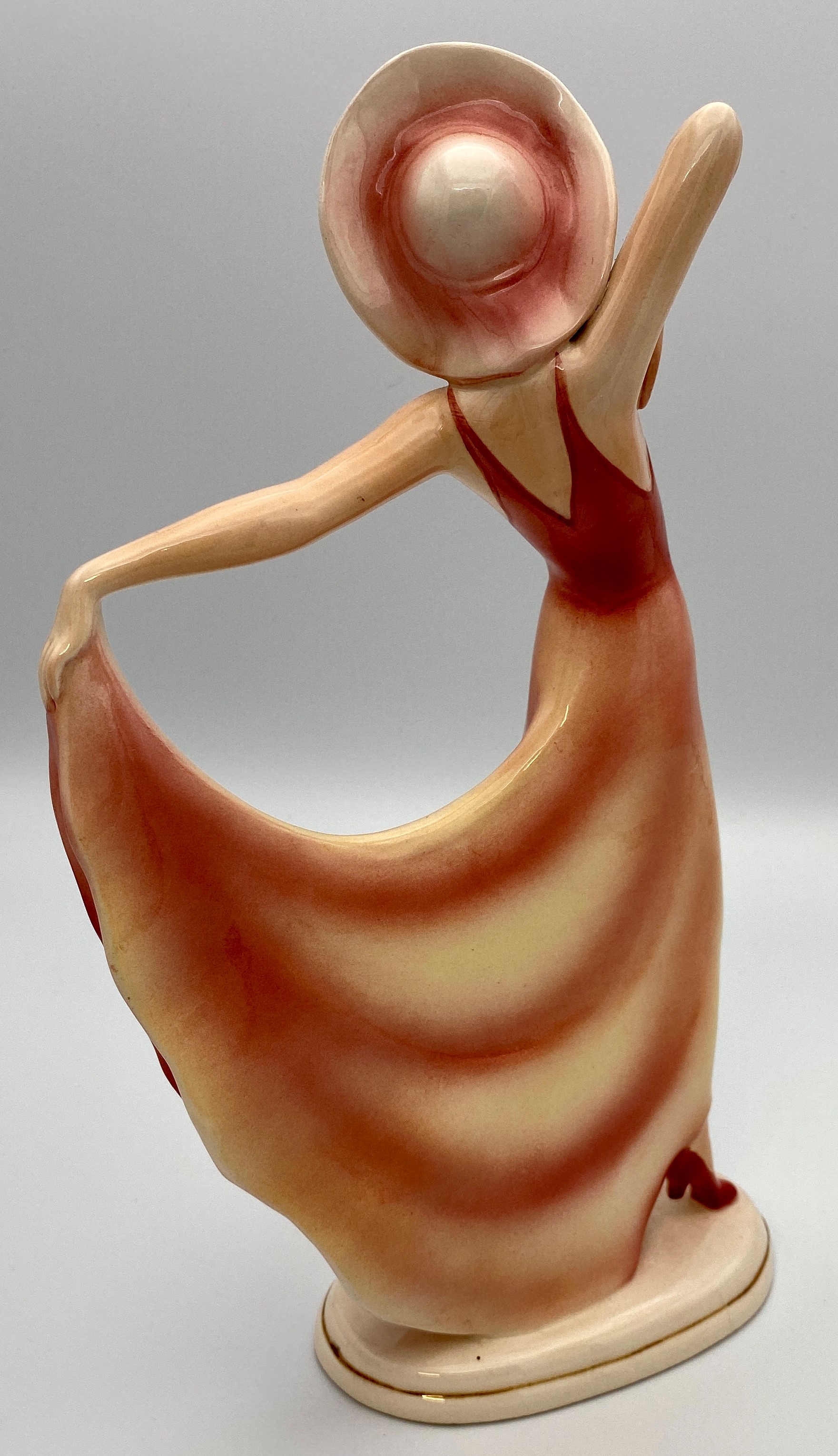 German Art Deco "Katshute" ceramic figure of woman in hat holding hem of pink dress, on oblong base, - Image 2 of 5