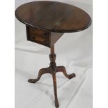 Small oval lap table in the 19th century style, with a single drawer figured as two drawers, on