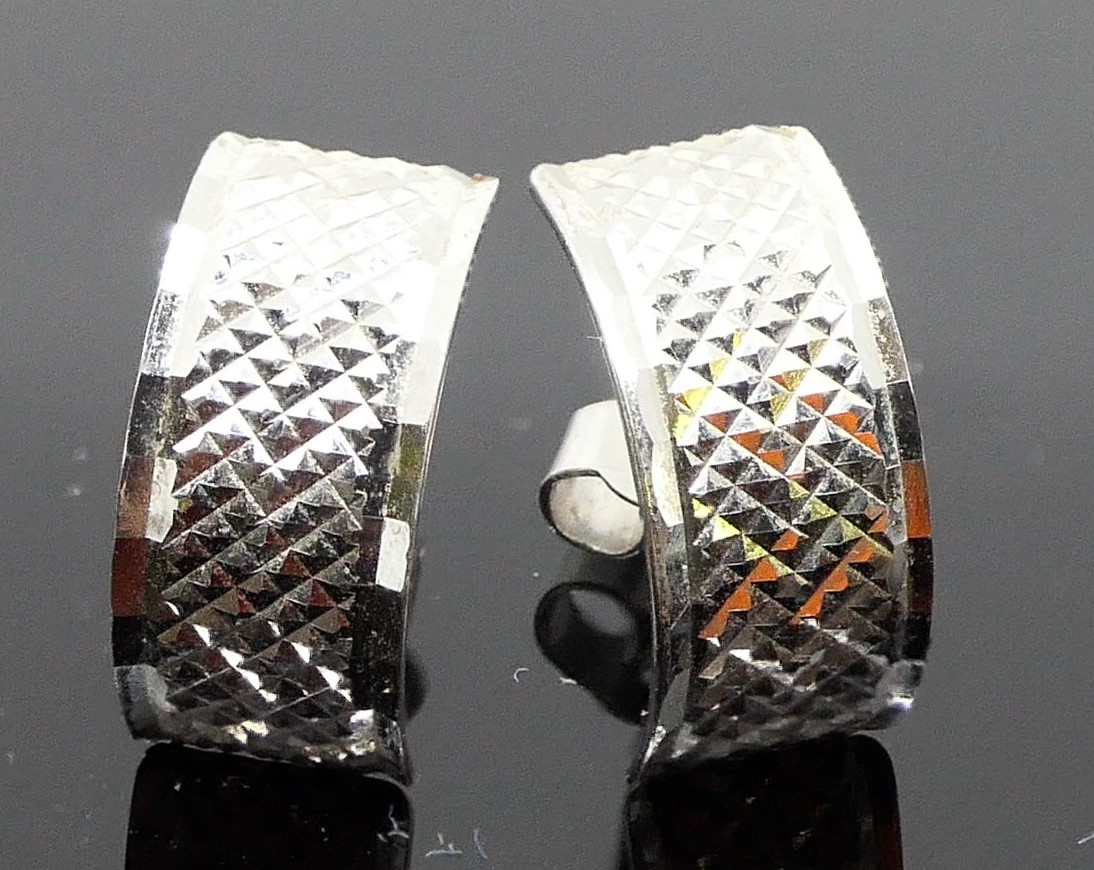 Pair of platinum half-loop earrings, British stamped marks, combined weight 1.4g, with a small