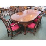 Mahogany D-end extending dining table and eight Sheraton style dining chairs (including two