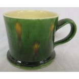 Kevin de Choisy (b 1954) large studio pottery mug or tankard in a green and ochre glaze, impressed