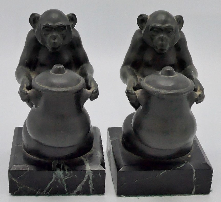 Max Le Verrier (1891-1973) - a pair of bronze bookends modelled as seated chimpanzees each holding a - Image 2 of 6