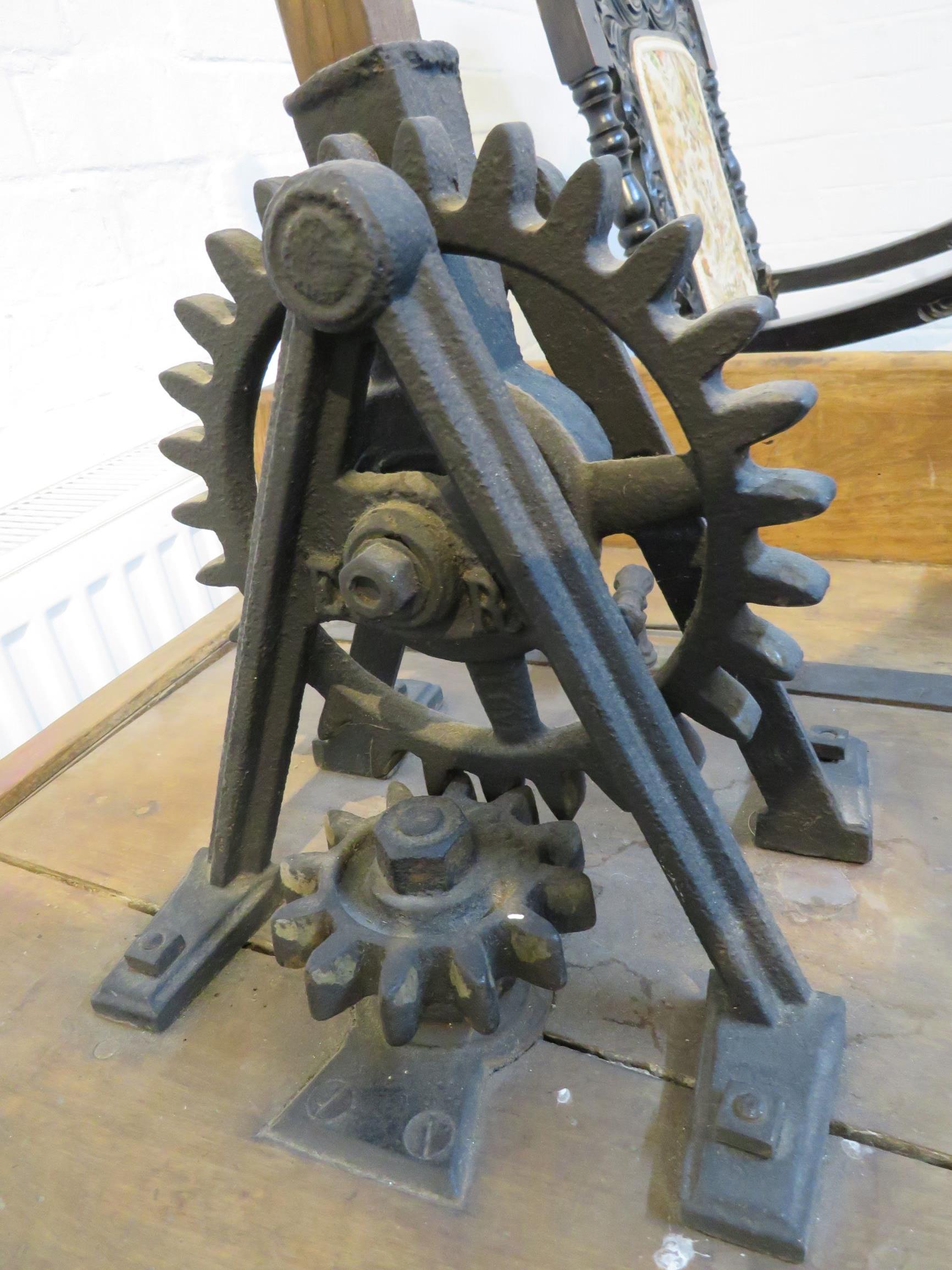 An early wooden tub washing machine fitted with a handle and gear mechanism to the lid driving a - Image 4 of 8